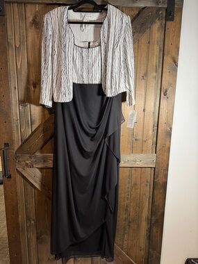 Elegant Black Evening Dress with Ivory Patterned Jacket